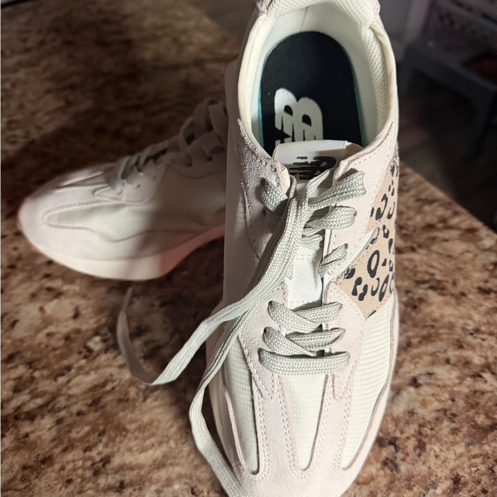 New Balance Sneakers leopard print logo on side, smoke free home, worn one time,
